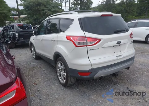 2013 Ford Escape Titanium z USA, uszkodzony, nr VIN 1FMCU0J99DUB43909